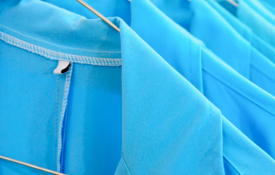 Blue Uniforms On Hangers 600X600